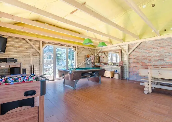 Pod Lasem Ferienhaus